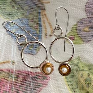 Silver and pearl earrings with gold tone